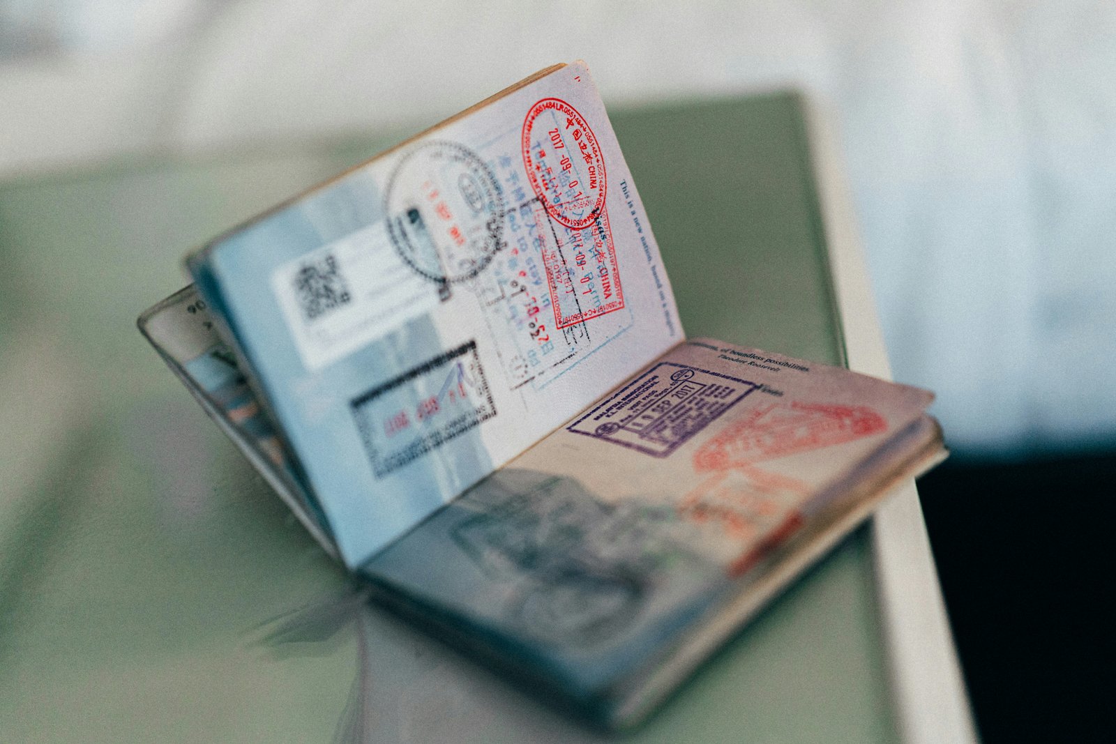 Documents and passport stamps being verified